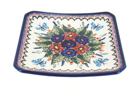 The floral plate is a combination of a blue floral pattern on a white base. Blue Rose Polish Pottery | Floral Butterfly Square Dessert ...