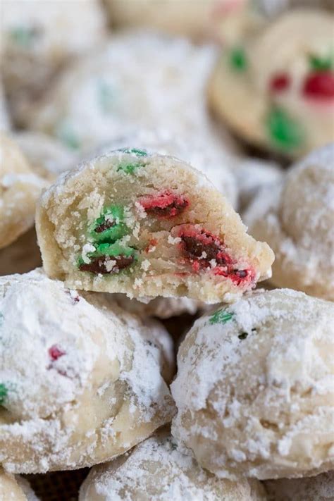 The dough is easy to work with, so it's fun to make these spritz cookies into a variety of festive shapes. Christmas Snowball Cookies | Recipe | Snowball cookies ...