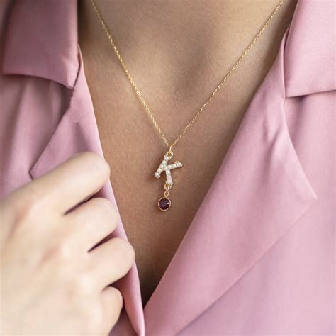 Check out our alphabet necklace selection for the very best in unique or custom, handmade pieces from our necklaces shops. Pearl Alphabet Necklace With Birthstone Detail By Joy By Corrine Smith ...