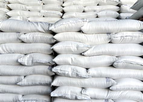 Sugar sack floral check blue. Stacks Of Sugar Sacks Stock Photo - Download Image Now ...