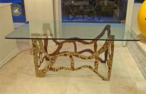 Pick a winner of a surface with the bravo dining table. Modernist Dining Table in Sand Cast Bronze and Glass ...