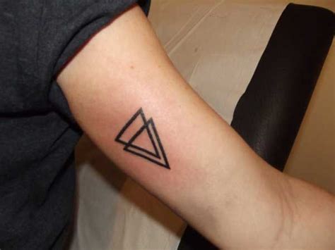 Virtually any image, logo or phrase can be worked into a triangle, and they're super customizable in terms of. Triangle Tattoo Designs, Ideas and Meanings - All you need ...