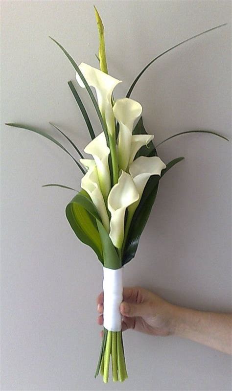 Check out our cala lilly bouquet selection for the very best in unique or custom, handmade pieces from our bouquets shops. After: Elly's wedding | Lily bouquet wedding, Calla lily ...