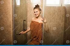 shower girl sexy bathroom young towel woman wrapped takes brown tile attractive stock background