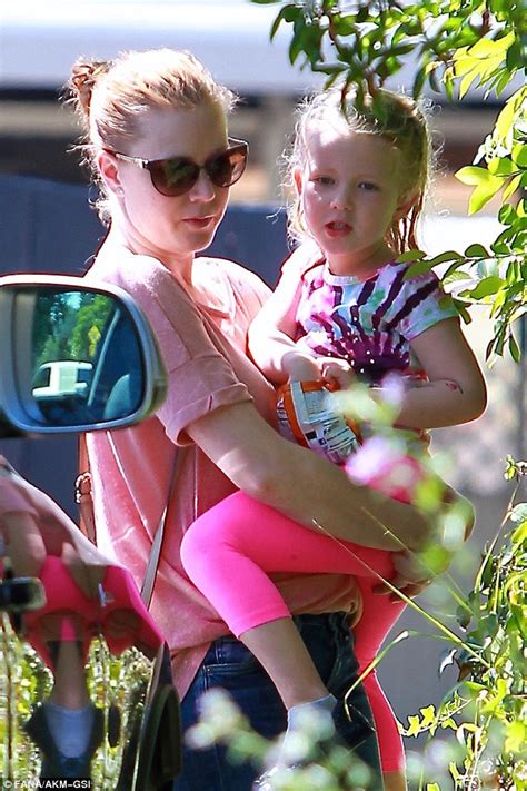 Out from under black flower bralette. Amy Adams and fiancé leave swim class with daughter Aviana ...