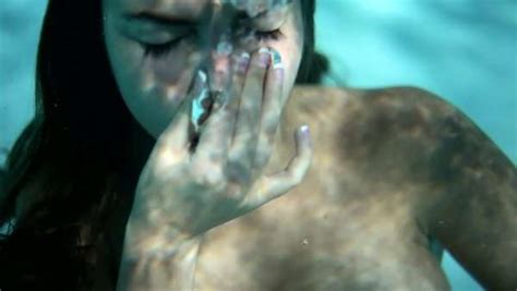 What's hidden underwater beneath atlanta's creepiest bridge? Naked young woman standing underwater in pool - Stock ...