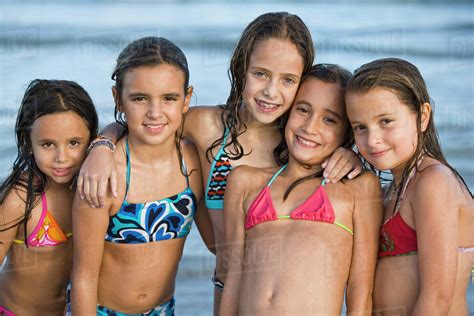 Busty latina gets tag teamed. Hispanic girls in bikinis posing on beach - Stock Photo ...