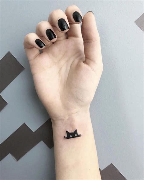 Cat tattoo marquesan tattoos animal tattoos. 35 Minimalist Tiny Tattoo Ideas To Look Beautiful in 2020 ...