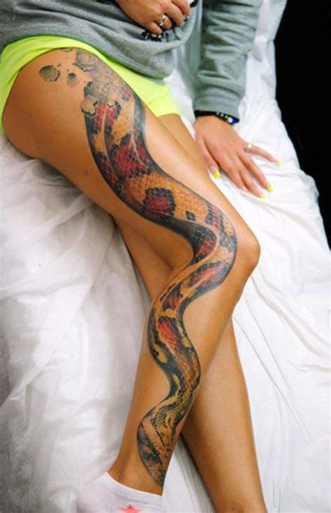 An artsy tattoo of a coiled snake. 28+ Snake Tattoos On Leg