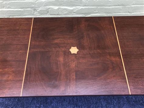 This coffee table is the very first time i picked up a hammer and nail. 1960s Dark Walnut Coffee Table with Inlay at 1stdibs