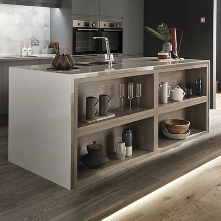 These dark cabinet doors look great when contrasted with lighter colours. Clerkenwell Gloss Slate Grey Kitchen | Howdens Joinery