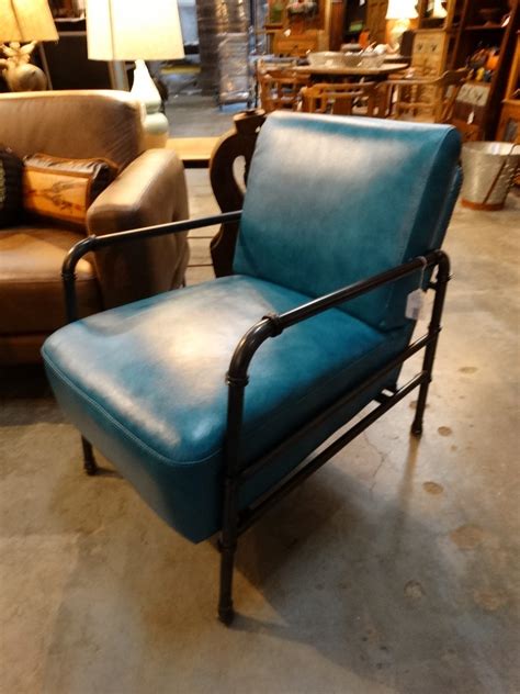 A luxurious, reclining, leather version with a headrest and footstool; Elegant Blue Leather Chair is compact and has an ...