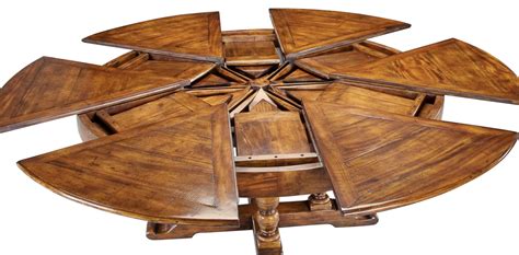 The top is veneered in walnut curl in a starburst formation with six lines of symmetry. Walnut Jupe Dining Table, Large | Walnut dining table ...