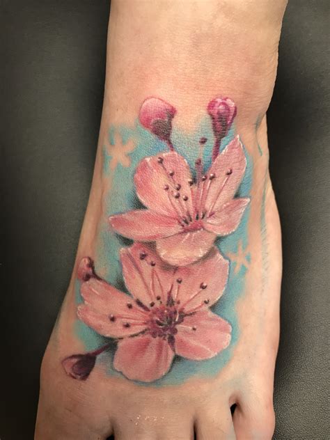 See more ideas about body art tattoos, blossom tree tattoo, blossom tattoo. Cherry blossoms on foot | Tattoos, Cherry blossom ...