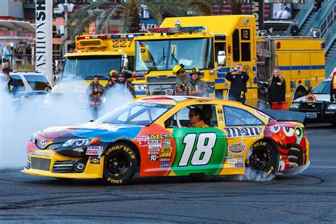 (right) signed autographs during a may practice at kansas speedway in kansas city, kan. NASCAR Recap: Toyota Driver Kyle Busch Nabs Win at Kansas ...