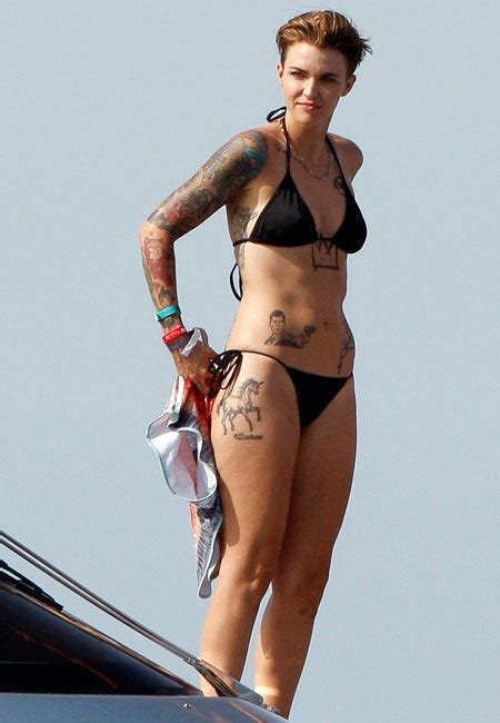 Ruby rose is a stunning actress and her tattoos just make her even more appealing to her fans. Ruby Rose Shows Off Bikini Body and Awesome Tattoos While ...