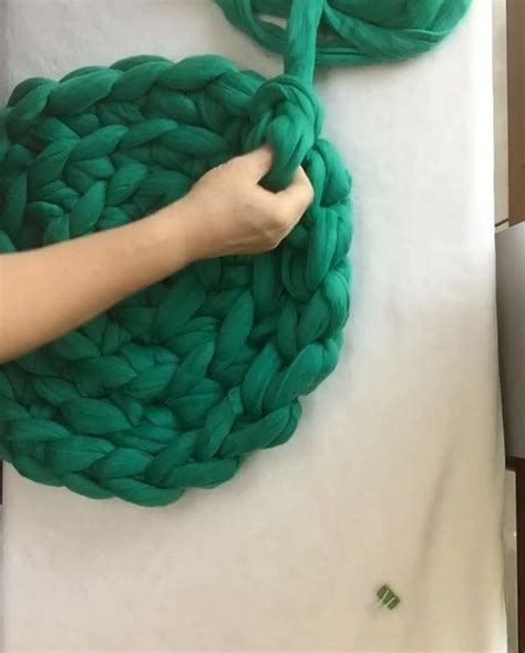 Arm knitted chunky 100% wool pet mat, chunky pet bed, natural wool dog/cat bed ,super giant bulky yarn, hand knit. How to arm crochet your cat bed. Watch BeCozi video on ...