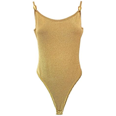 Check out our zigzag tank top selection for the very best in unique or custom, handmade pieces from our shops. 1990s Donna Karan Gold Metallic Bodysuit at 1stdibs