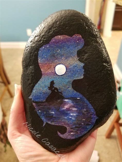 Give special attention to the eyes since they could make the whole picture/sketch. Ariel Little Mermaid painted rock. Disney Princess # ...