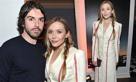 This seemingly marked the first time that elizabeth had referred to robbie as her husband. Elizabeth Olsen cosies up to boyfriend Robbie Arnett in LA ...