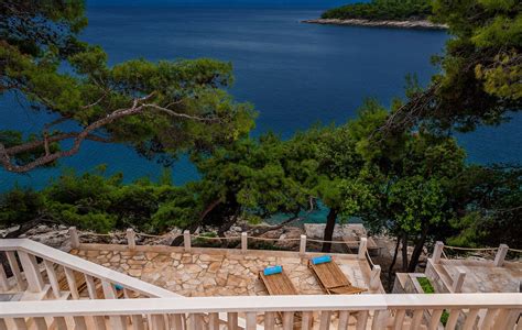 (ok, they're artificial, of course, this is norway, but a father taking photos of his daughter (on a kickbike) and wife in the distance, kneeling. Villa Mala in Sumartin, Brac Island | Croatian Villa Holidays