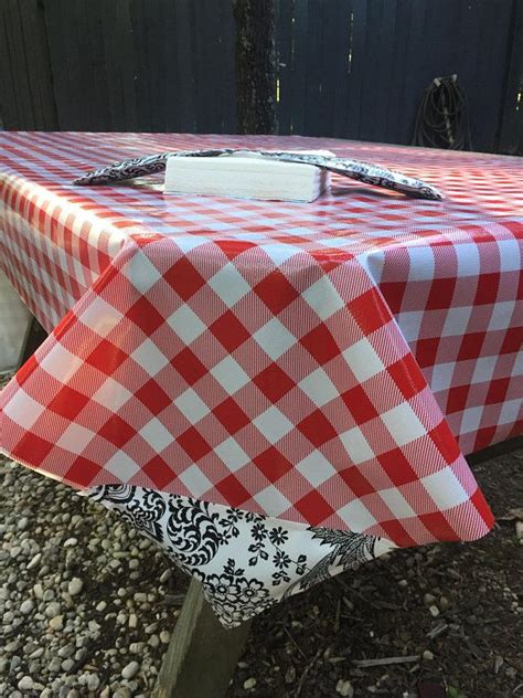 Looking for a good deal on holder napkin? 47"x92" Weighted Picnic Tablecloth & Napkin Weight ...