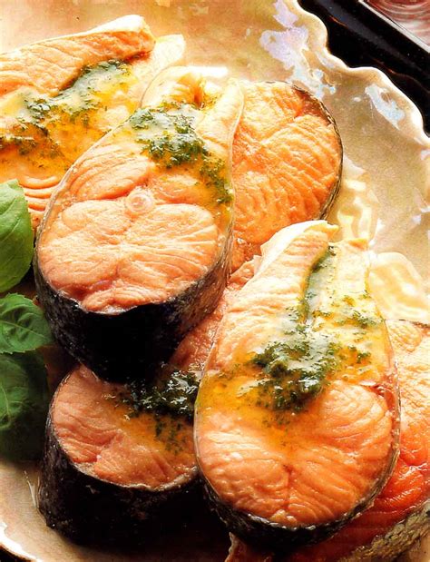 This sensational salmon marinade combines honey, lime, garlic, and cilantro. Poached Salmon Steaks with Hot Basil Sauce-Low Fat-diet recipe-calories-nutrition facts