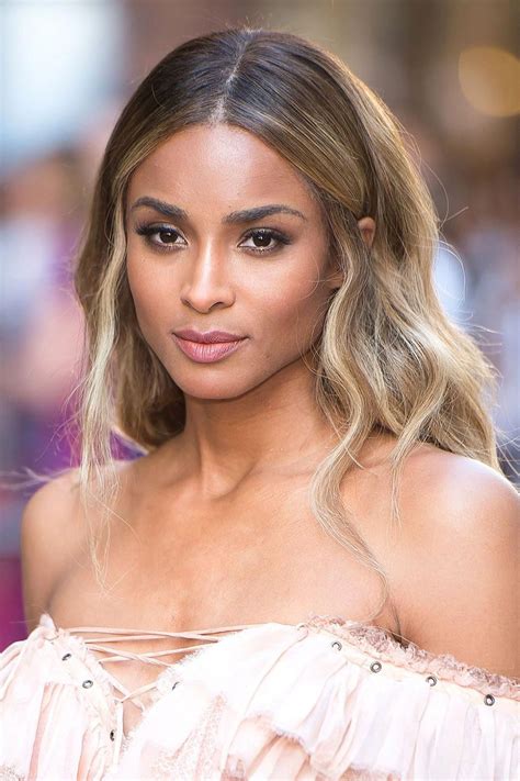 Ciara trades blonde bob for long, dark hair. Ciara #coloristas | Dark skin blonde hair, Dark roots ...