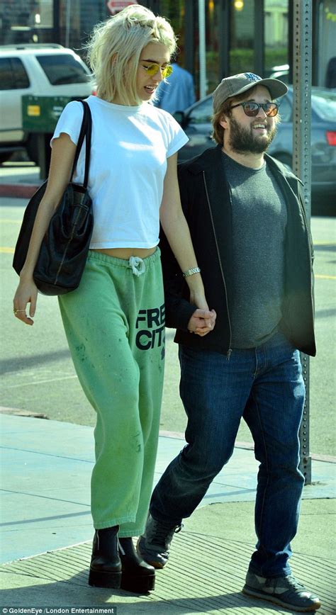 This was a photogrammetry project of a porcelain figurine. Haley Joel Osment holds hands with statuesque girlfriend ...