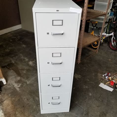 Label holders for quick and easy identification of contents. GREY HON 4 DRAWER METAL FILING CABINET - Big Valley Auction