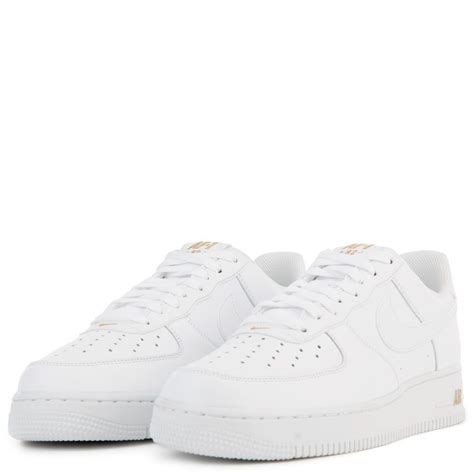Initially designed in 1982 as a performance sneaker, nike air force 1 gained street cred and worldwide acclaim after multiple marketing campaigns showcasing nba. NIKE AIR FORCE 1 '07 WHITE/METALLIC GOLD