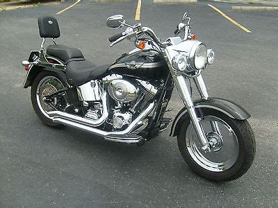 This harley davidson fat boy 100th anniversary has been upgraded with flame grips, chrome switch housings, clutch perch and front brake master cylinder, quick detach backrest hardware, live to ride primary inspection cover, front axle cover, vance & hines exhaust, and intake. 2003 100th Anniversary Softail Motorcycles for sale