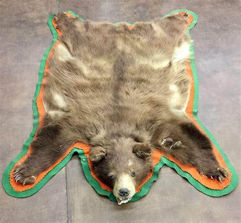 Check spelling or type a new query. Old Brown Bear Hide Rug