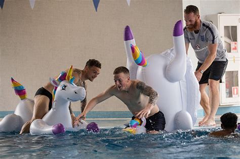 Harry maguire riding an inflatable unicorn. England team lark about at World Cup camp on inflatable ...