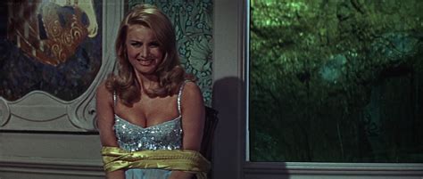 The secretary to the head of the british secret service. Casino-Royale-1967-0760