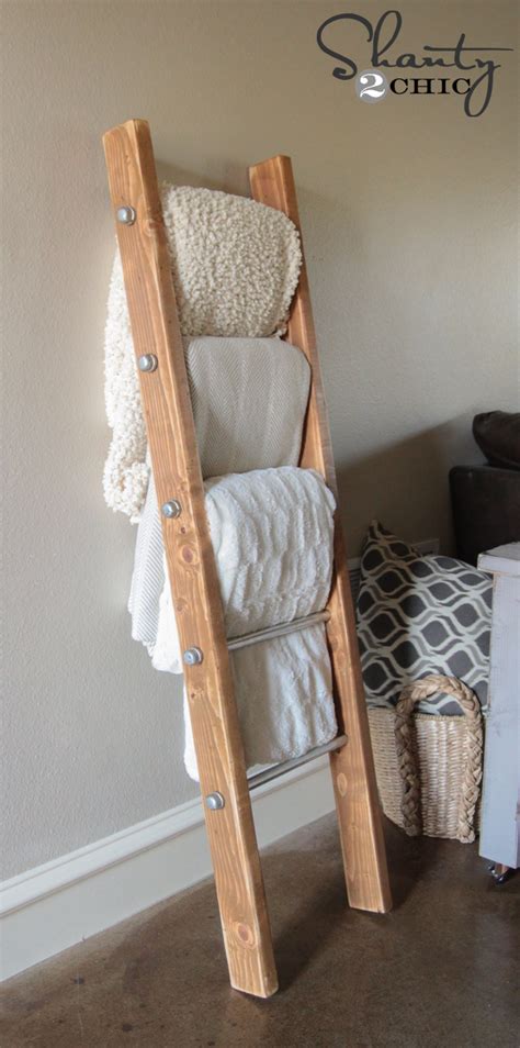 Diy blanket ladder for less than $5 a great tutorial and an easy project to add a great piece of organizational decor to your home. DIY Wood and Metal Pipe Blanket Ladder - Shanty 2 Chic