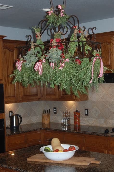 Pot rack ladder with hanging pots and pans. Functional Christmas decor for a kitchen pot rack ...