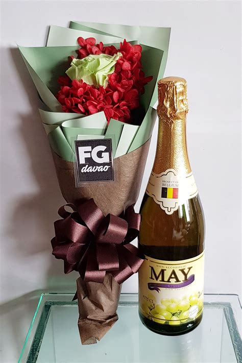 Need flowers delivered for that special occasion? Preserved Flower Bouquet and Wine www.FGdavao.com Send ...