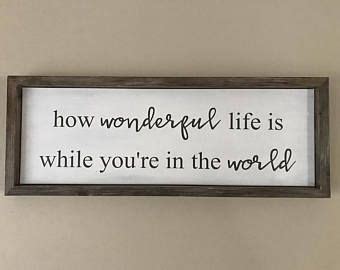 The quote from louis armstrong's famous song, what a wonderful world, fits perfectly with the worn, humble style of the rustic board it's printed on. Rustic Sign - How wonderful life is while you're in the world - Nursery Wall Art / Bedroom Wall ...