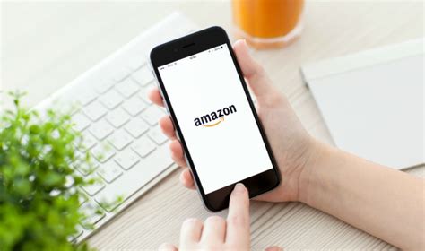 It's a white app with a blue shopping cart and the amazon logo. Amazon Singapore: 5 reasons why the retailer's launch in ...