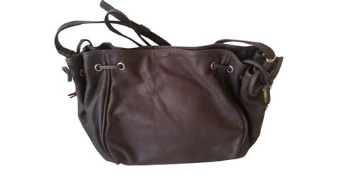 Sac à main de la marque gerard darel réalisé en cuir de vachette pleine fleur et doublé synthétique. Sacs à main Gerard Darel MINI 24H Cuir Gris ref.30382 ...