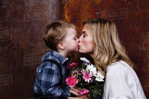 My favourite films by defenestrated jack. Young boy giving bunch of flowers to mother, mother ...