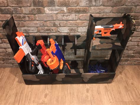 Nerf board made from a peg board nerf gun cabinet. Ideas To Build A Nerf Gun Rack - 4 Ways To Modify A Nerf ...
