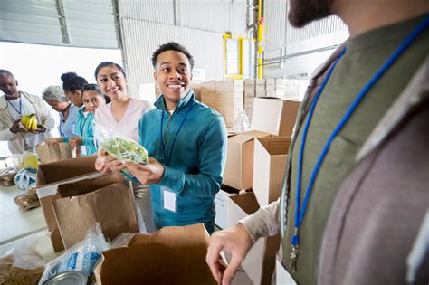 Odessa, texas 79761 counties covered: Cheerful Volunteers Working In Food Bank Stock Photo ...