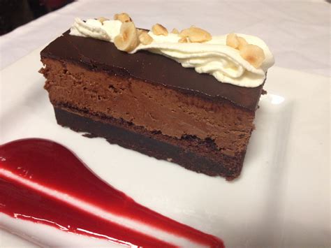 In food terms, the history of chocolate mousse is relatively recent, simply for the fact that chocolate itself came to europe rather late. Chocolate mousse cake with hazelnut and raspberry coulis ...