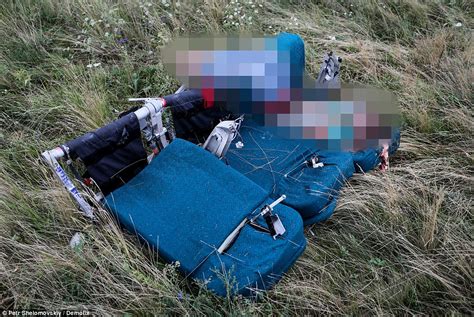 Members of the ukrainian emergency ministry search for bodies near the site of thursday's malaysia airlines boeing. faudzil.blogspot.com: FLIGHT MH17 - Graveyard of ...