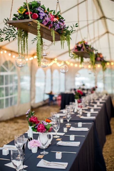 Below i'm sharing 15 amazing ideas for how to make your ordinary wedding tent, extraordinary! Hanging centerpiece. Tent wedding. Colorado wedding ...