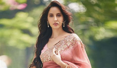 She is mostly known for her gorgeous look and glamorous style in the films. Nora Fatehi Age , Carrier ,Movies ,Song & more