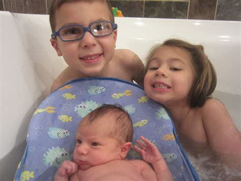 Bathing toddler and infant at the same time. T- Rex Mom and Dad Tales: Bath Time...