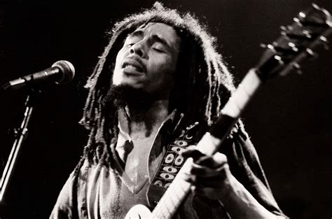 Bob marley is written in a cursive font. Bob Marley's 'Exodus' Turns 40: Classic Track-by-Track ...